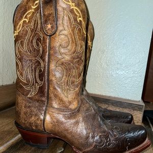 Fit a little tight, very nice boots